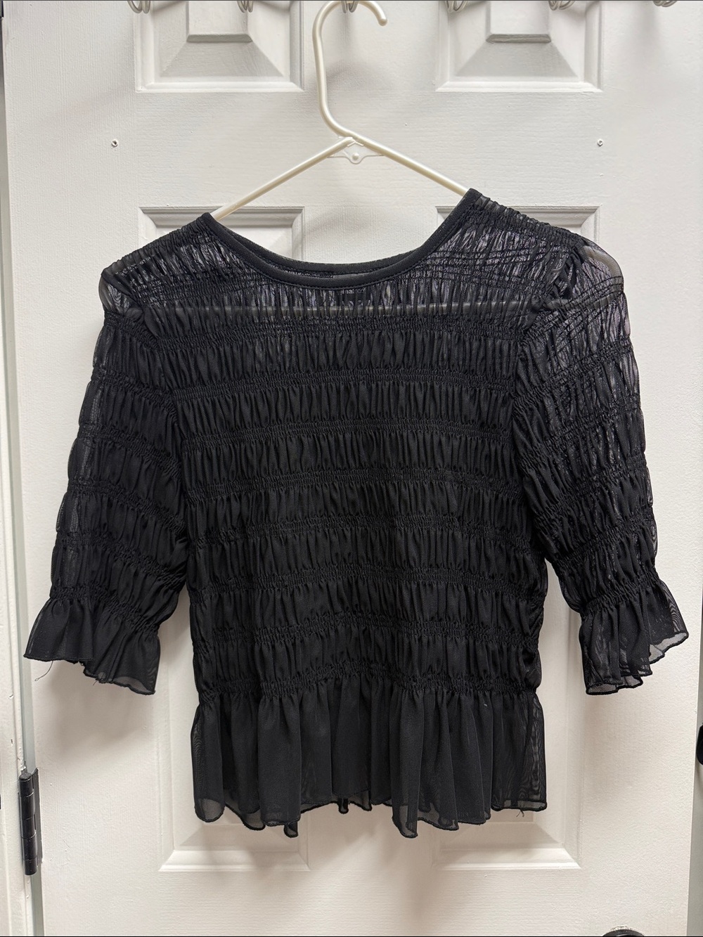 Black Smocked Ruffle-Hem Women's Blouse